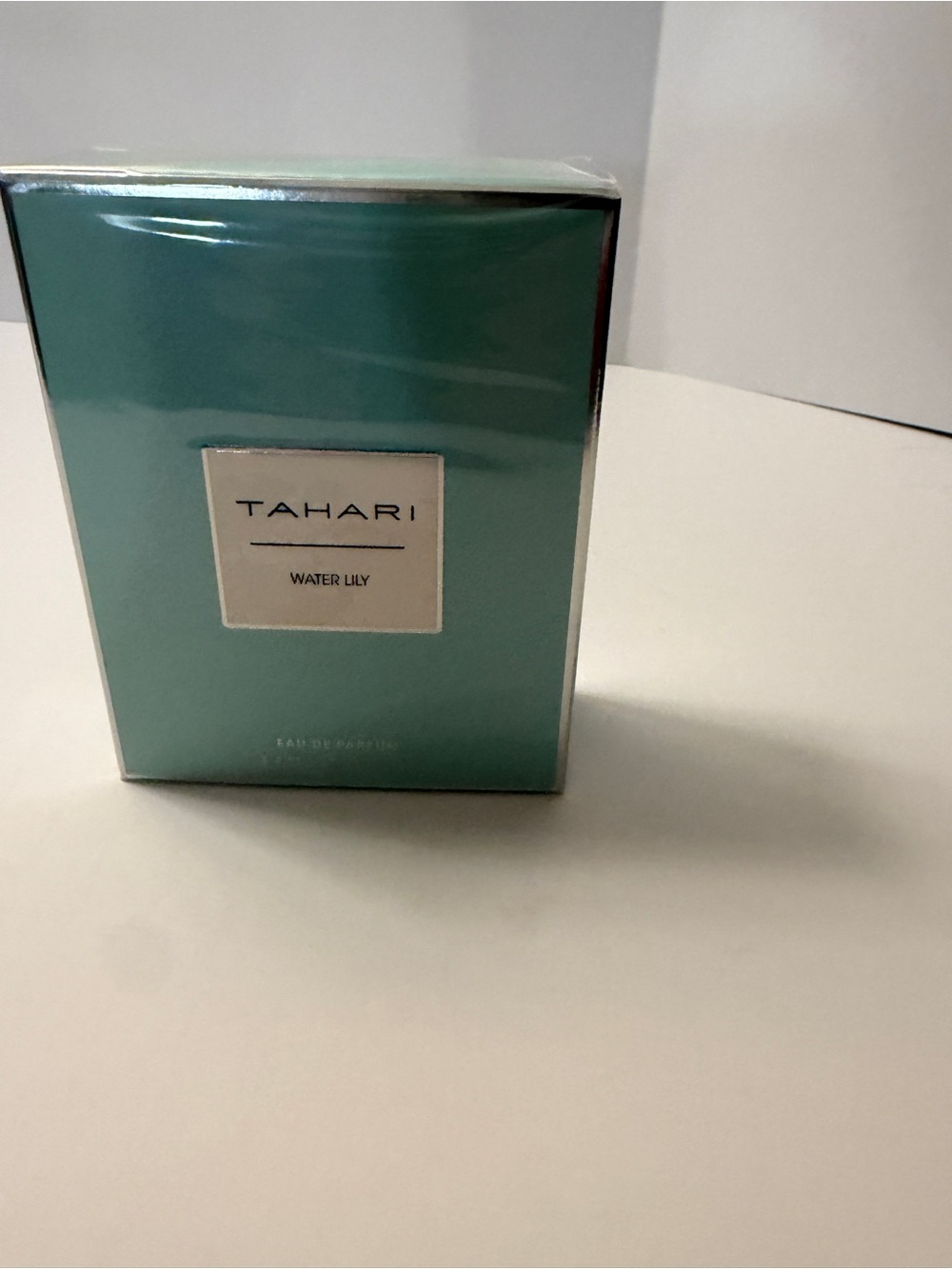 Tahari Water Lily Fragrance in Teal Packaging